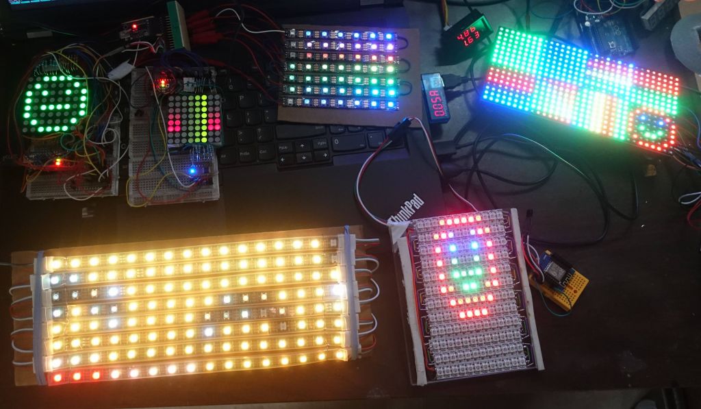 2 row scanned matrices on the upper left, 7x7 neomatrix, another row scanned 32x16 Adafruit panel.