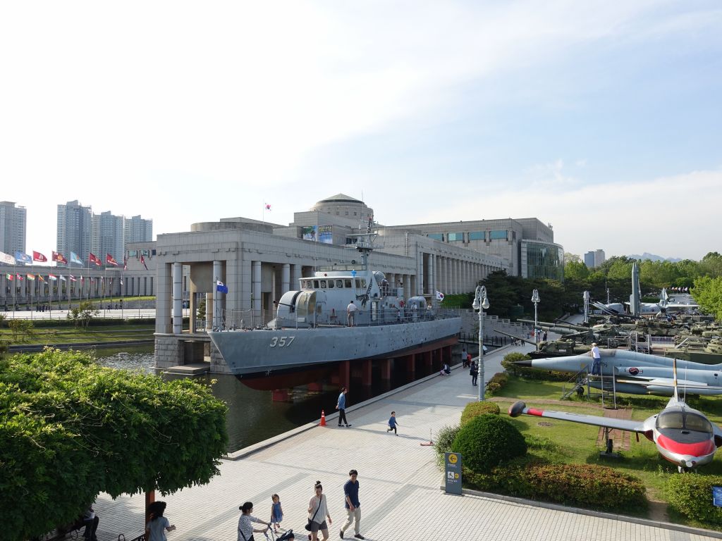 and a replica of the boat that was recently shot and sunk by North Koreans