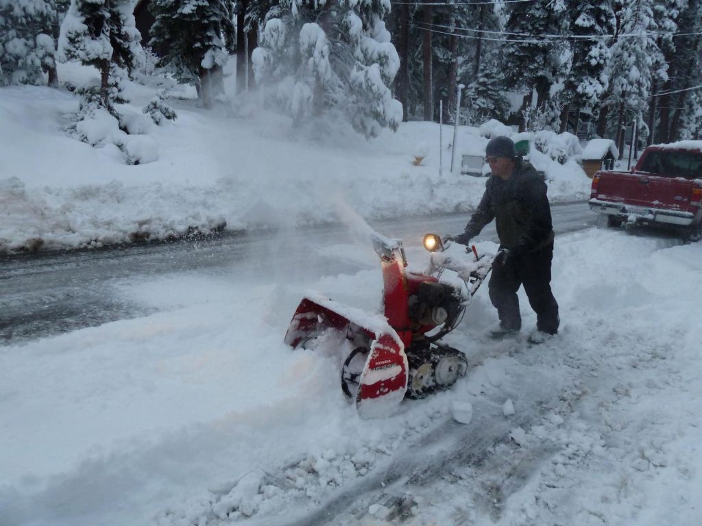 neighbour clearing the road so that we could get out of the driveway