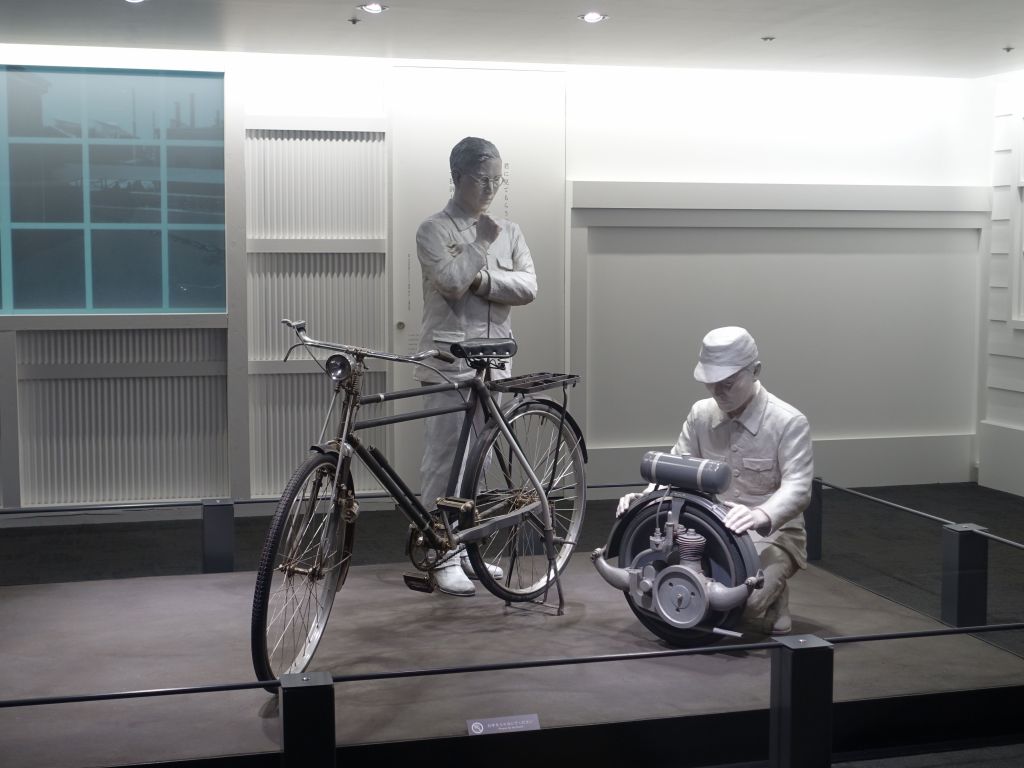 before making cars, toyoda made a bike helping motor