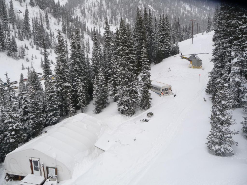 silverton: a tent, a burried schoolbus, and the heli