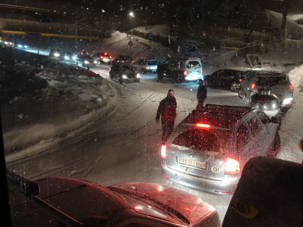 in turn, our bus had a hard time driving down with stuck trucks on the way blocking the road