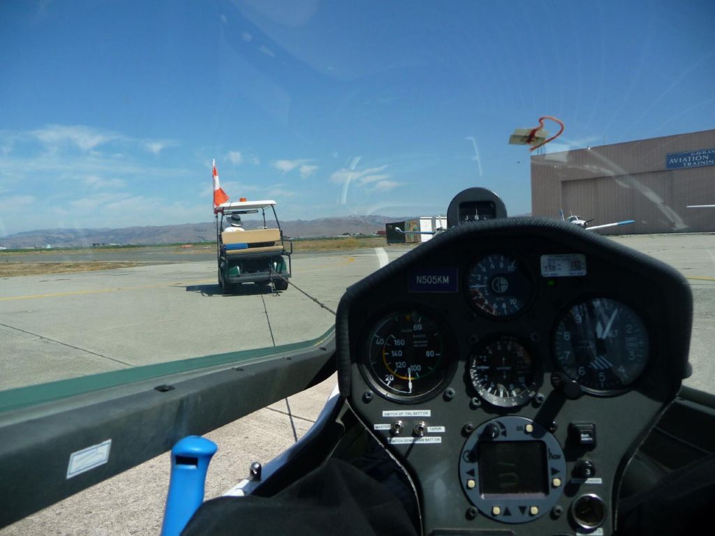 golf car tow to the runway