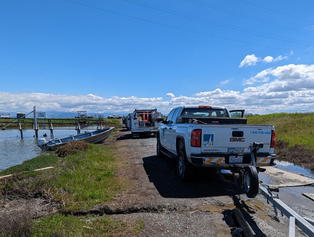 lots of PG&E trucks and even boat to try and maintain the lines