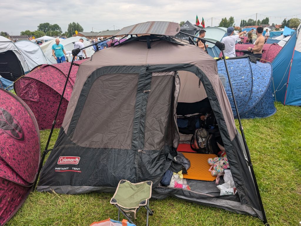 brought a semi proper tent with solar panels that barely made enough power to recharge much