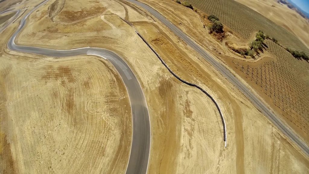 I also never noticed that tire wall to protect people driving on the highway from being hit by an out of control car