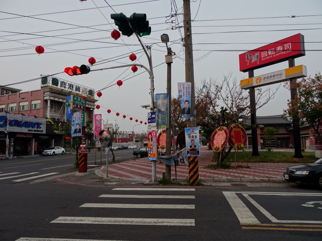 7 different voting signs in this intersection