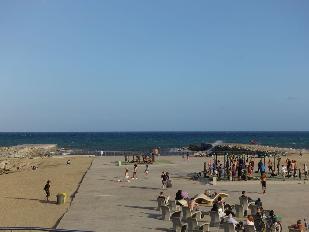 people working out on the beach