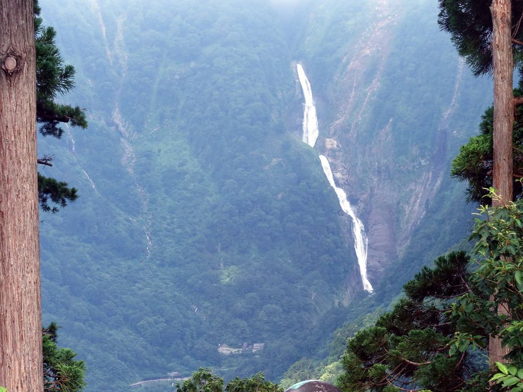 big waterfall visible from the bus on the way down