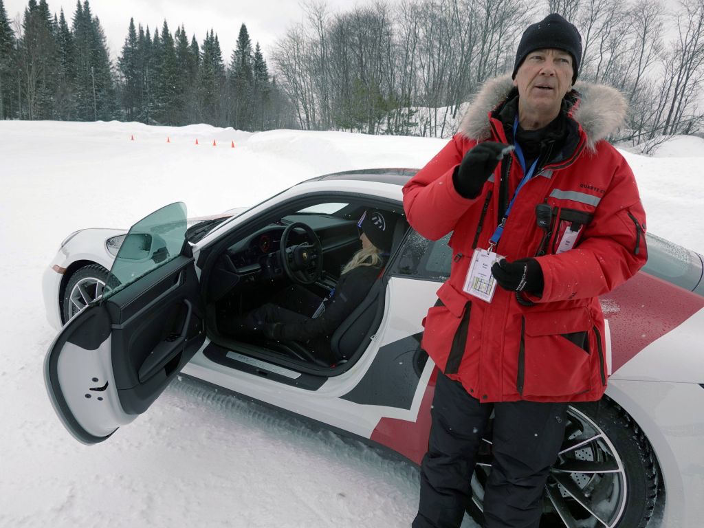 Kees, our instructor, introducing the cars to us, with our assistant, Emilie