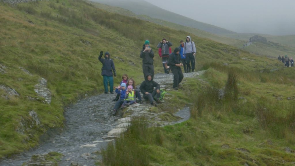 poor hikers who did all this in the rain for no views