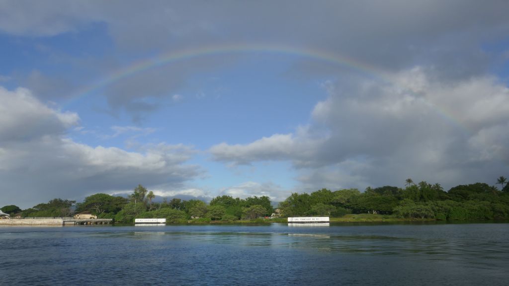 rainbow over the location of struck ships