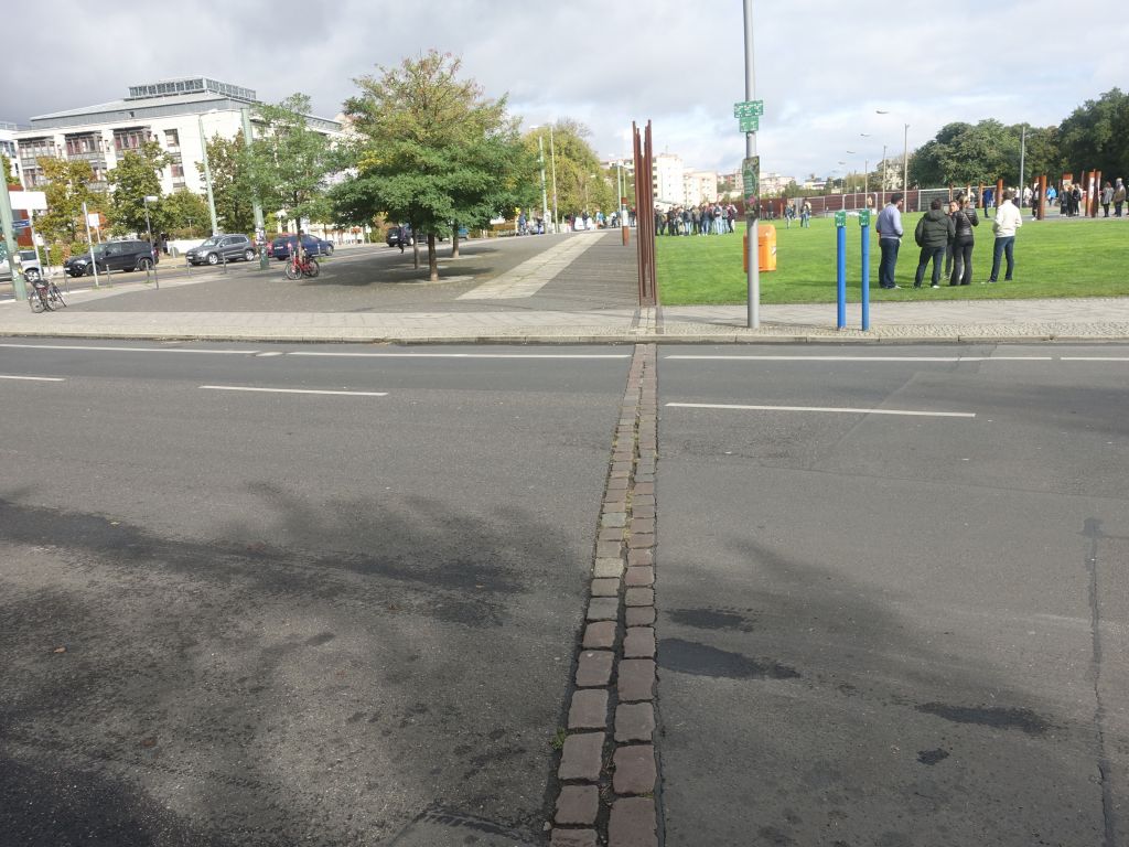 in some places, the pavement shows where the wall used to be