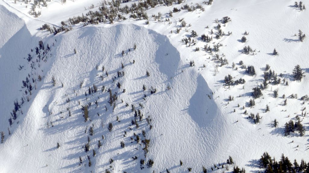 I hiked up the hill to ski down that face a couple of times