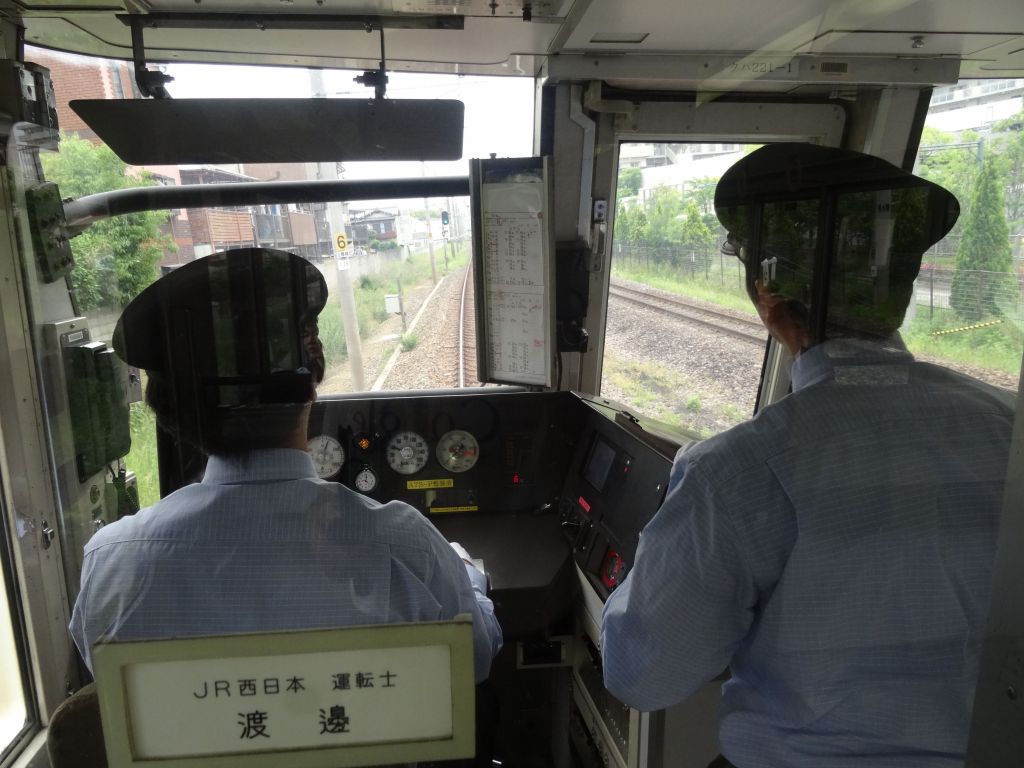 Trains kind of drive themselves nowadays, but they still make it look like serious business, with white gloves :)