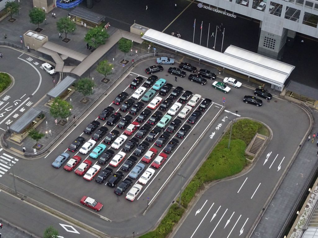 many taxis waiting by Kyoto station. they should have been in the streets where I needed them :)