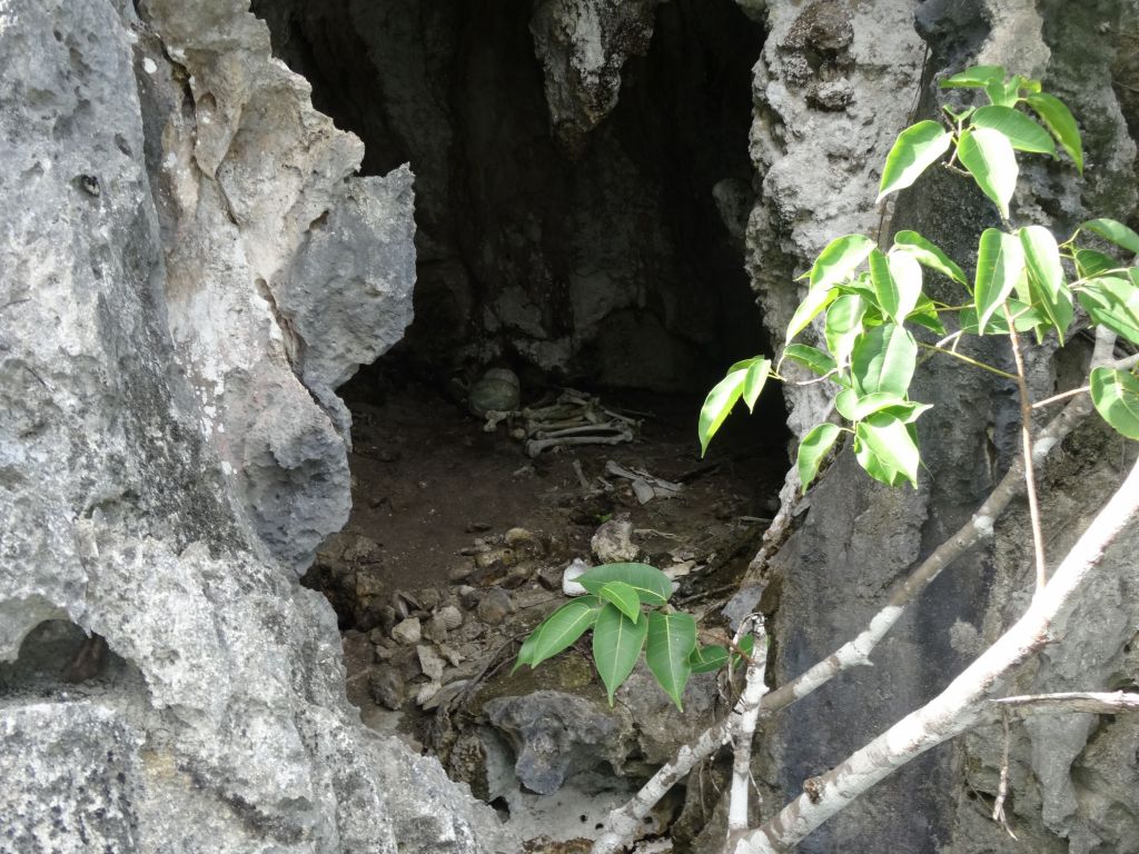 the local tribe buries their deads in caves by the water