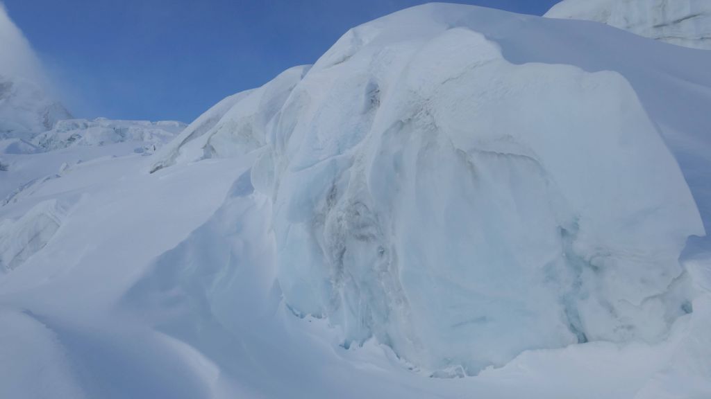 lots of ice blocks and seracs that could detach and fall on us, our uide had to keep track of them