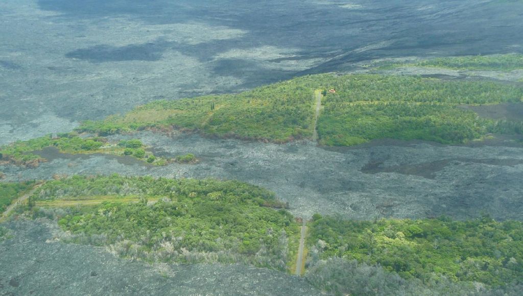 you can see the lava flow through 2 roads and a forest